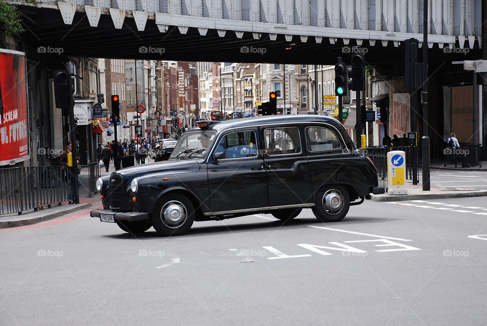 Black cab on London's street. UK.