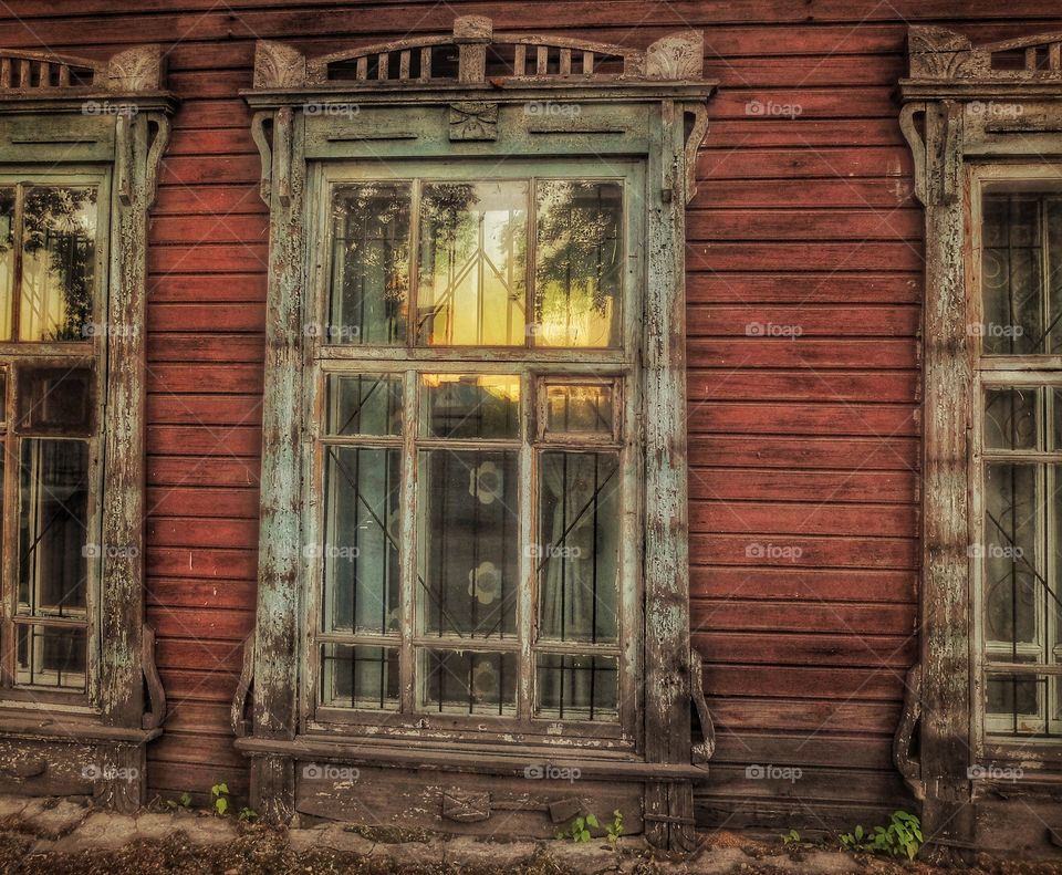 Old window. . I love to take pictures of old buildings. This shot was made in Barnaul, Russia. A lot of history behind this window. 