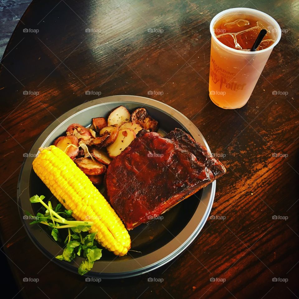 Meal and butterbeer from Three Broomsticks at the Wizarding World of Harry Potter.