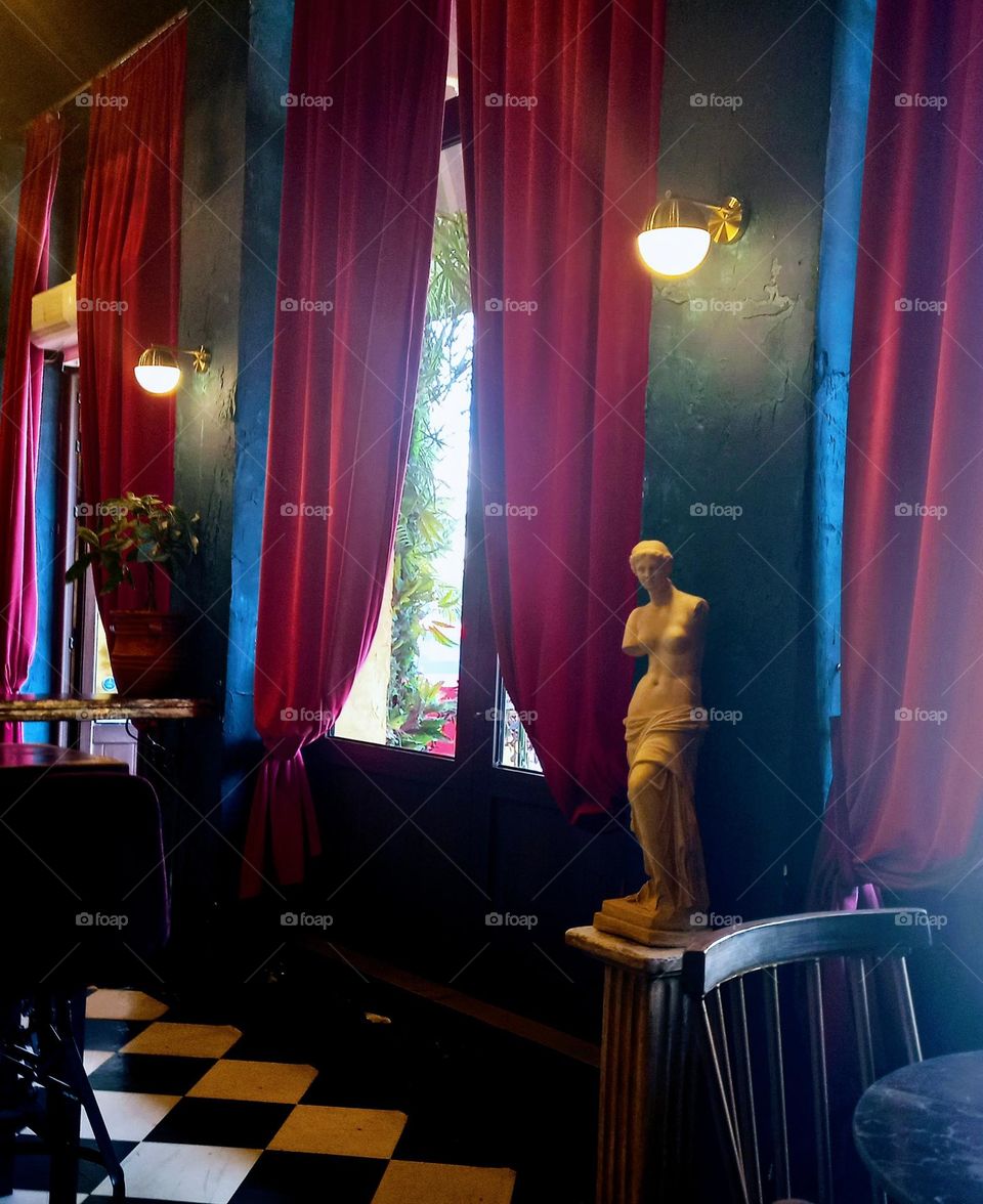 Decoration with a scalpture of  an ancient Greek God.