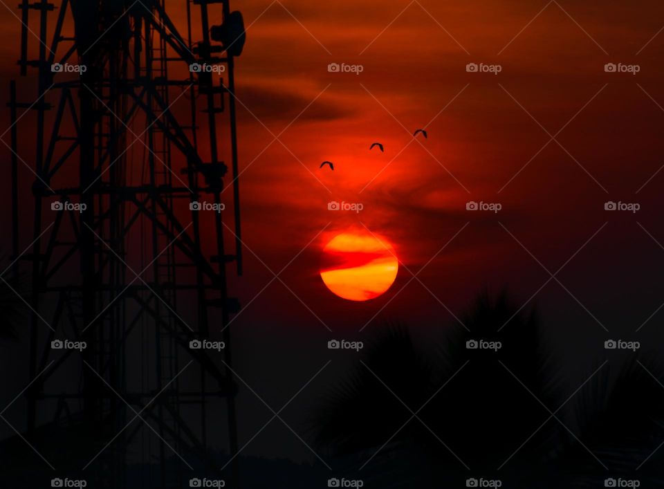 A beautiful sunrise behind the mobile tower