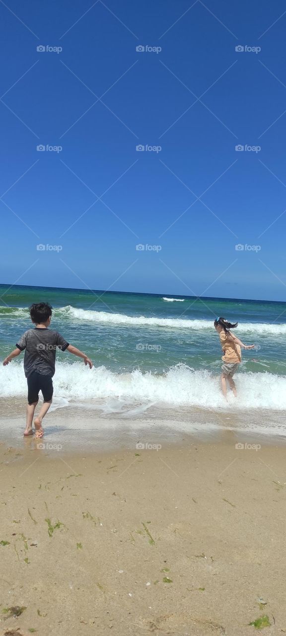 Kids playing on the beach