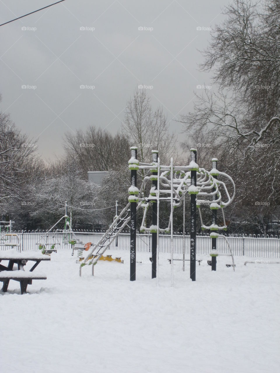 playground in the park in winter
