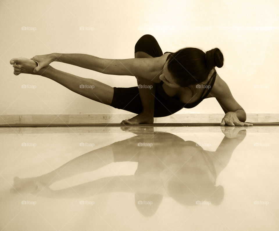 Female doing yoga exercise