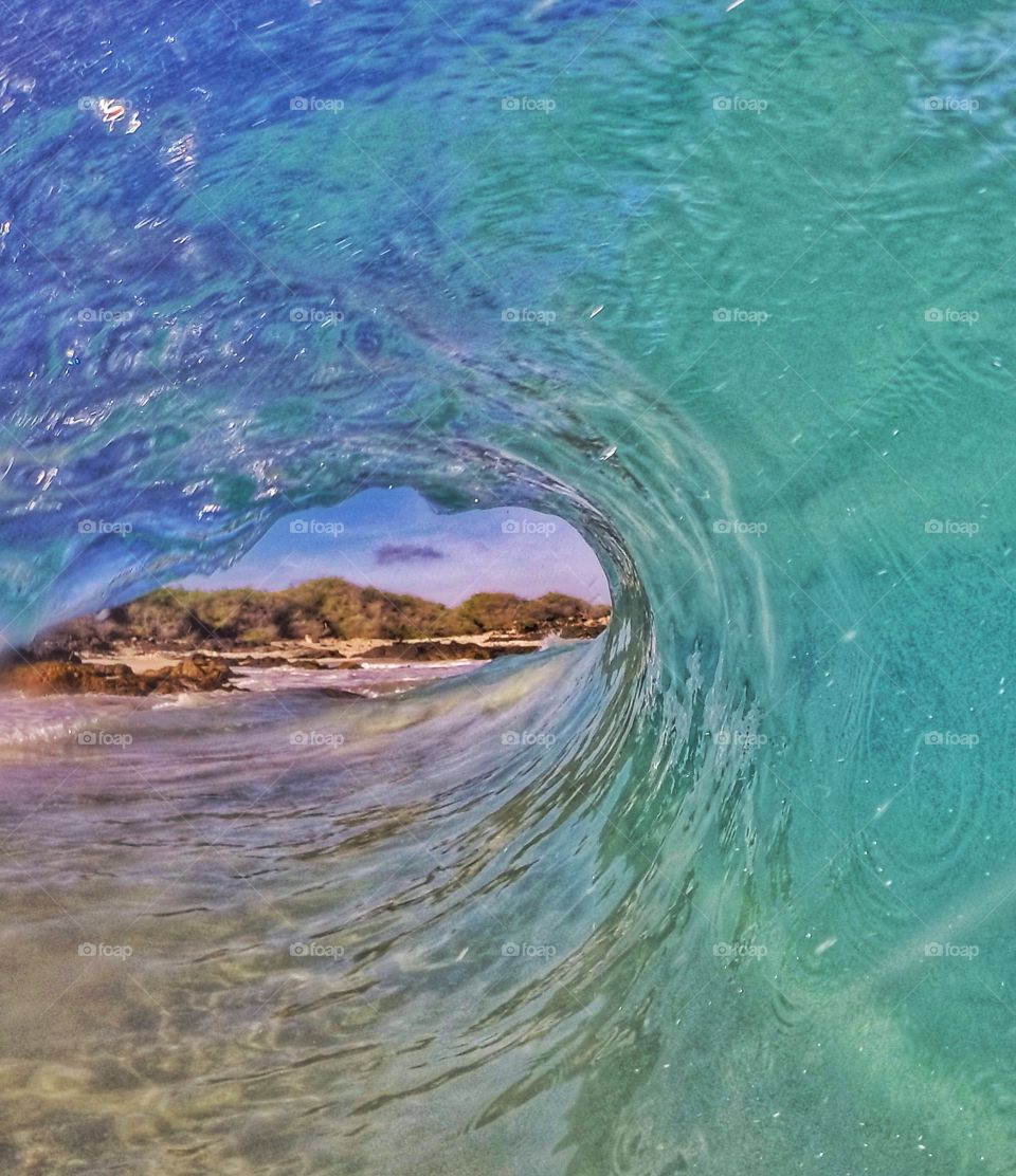 Tunnel vision. In front of the rocks and over the reef.  Waiting to take this gem