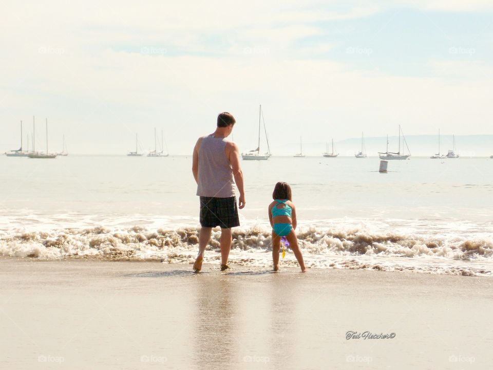filling the bucket with water