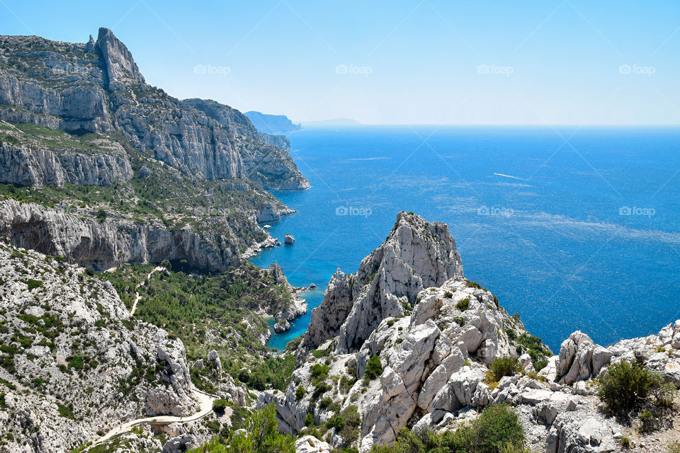 Azure sea and white mountains near Marseille. National park Calanques de Marseille. View from the observation deck Belvedere de Sugiton