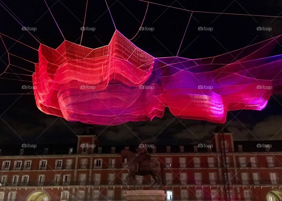 Gigantic color-changing art installation in a major plaza. The unexpected art is both breathtaking and curious inviting the viewer to stay and watch and wonder. 