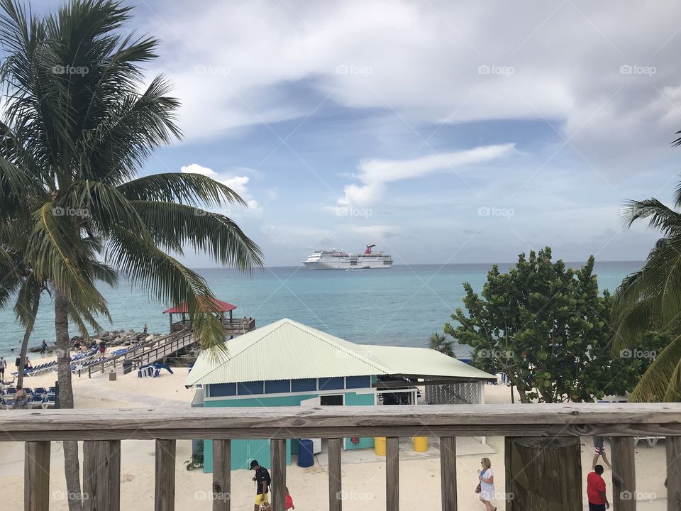 Carnival elation in the background of princess Cays Bahamas 