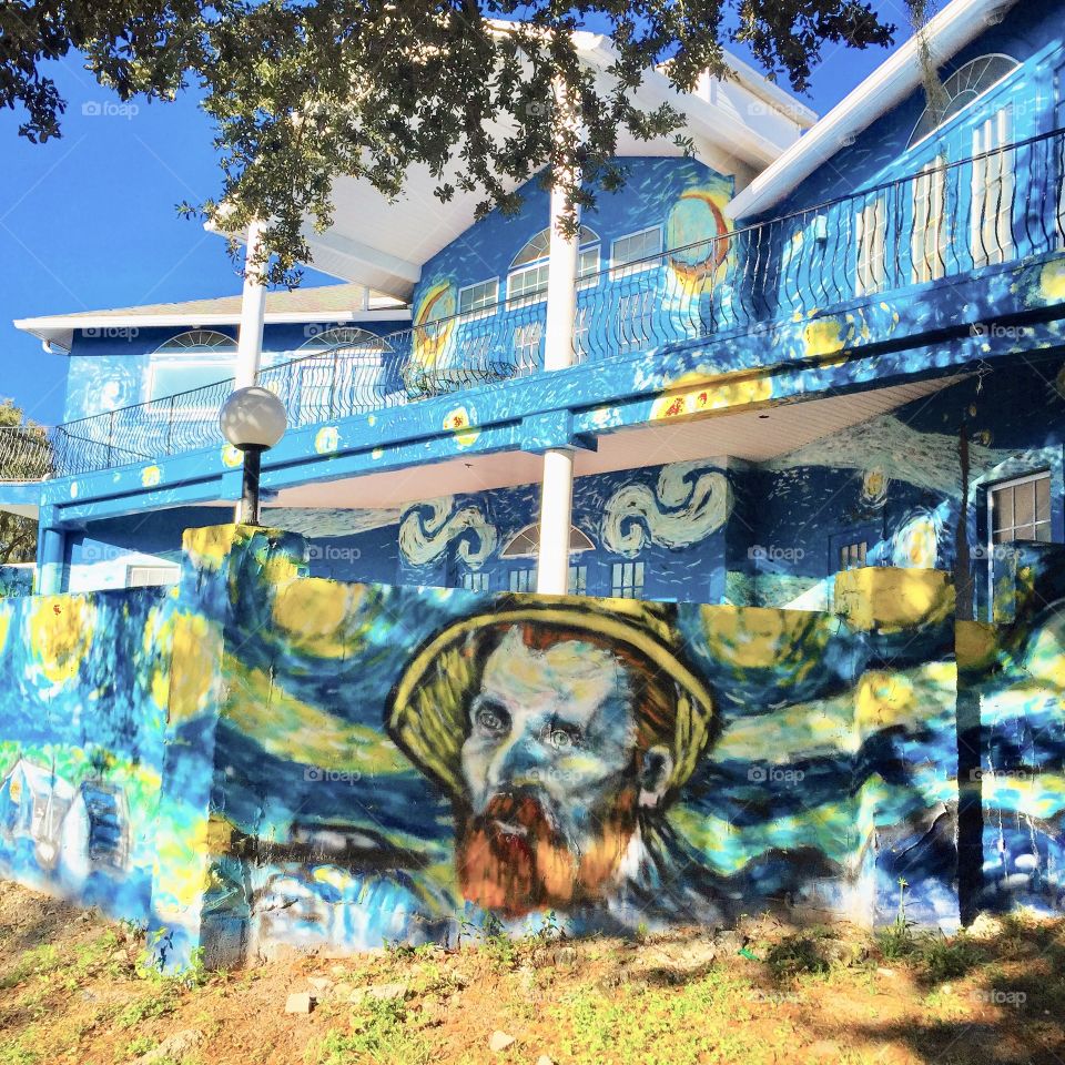 Infamous house painted entirely with a Starry Night themed mural in Mount Dora Florida 