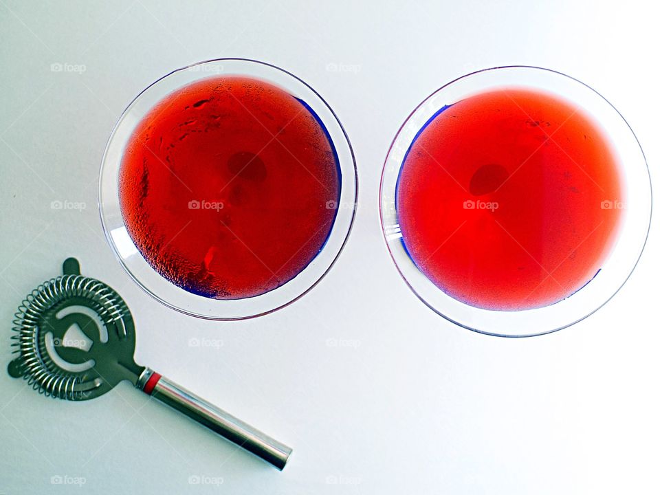 Overhead shot of two red martinis 