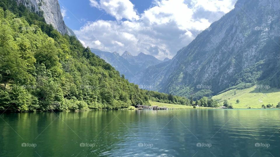 Beautiful landscape view of mountains at green lake Königsee in Berchtesgaden Germany taken from the seaside 