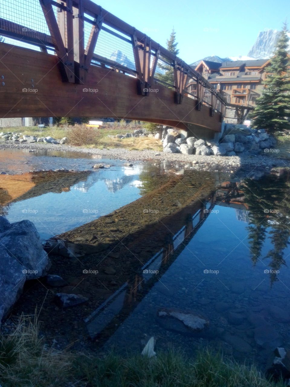Bridge reflections. Reflections bridge in water