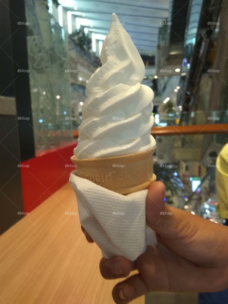 Vanilla ice cream in my hand, milky and sweet