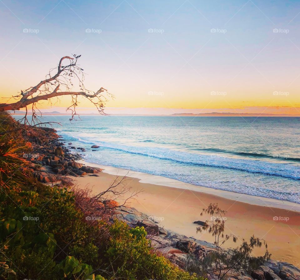 The start of a beautiful day - sunrise on the desolate beach - dawn in the tropics 