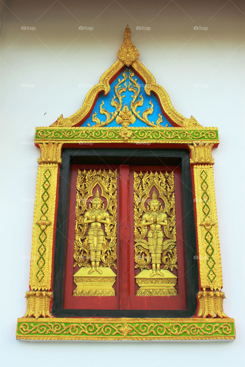 Window thai style at the Thai temple. The art of Thailand.
