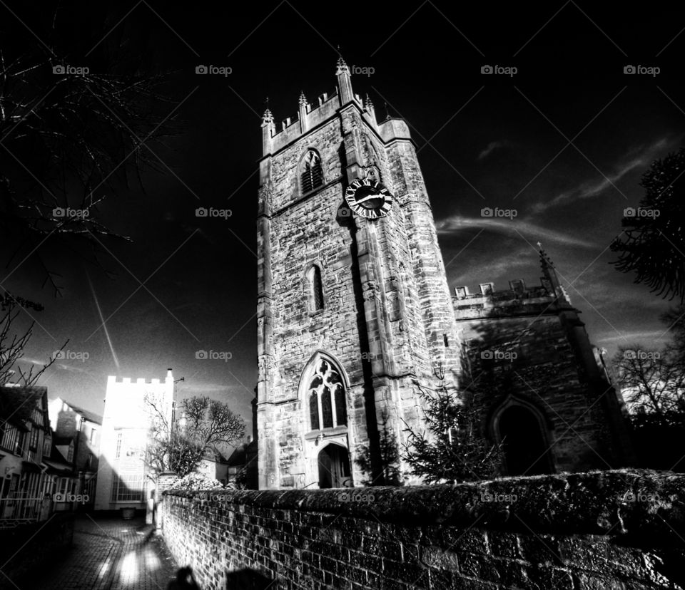 Church - Anglican Church of England traditional village parish church in the English Midlands Warwickshire England uk - edited in high contrast black and white 