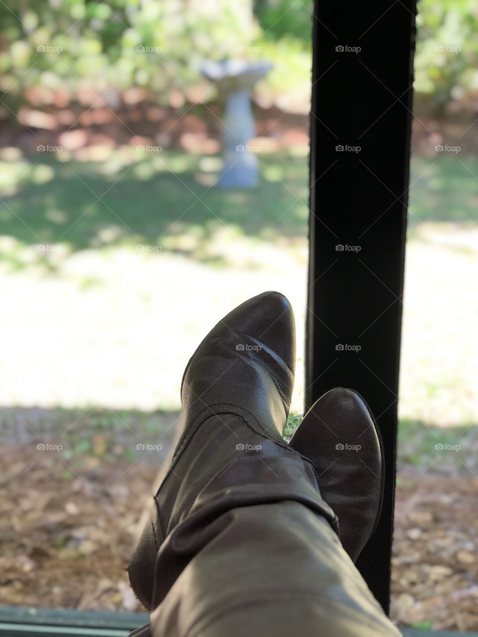 Looking at brown boots from the dental chair