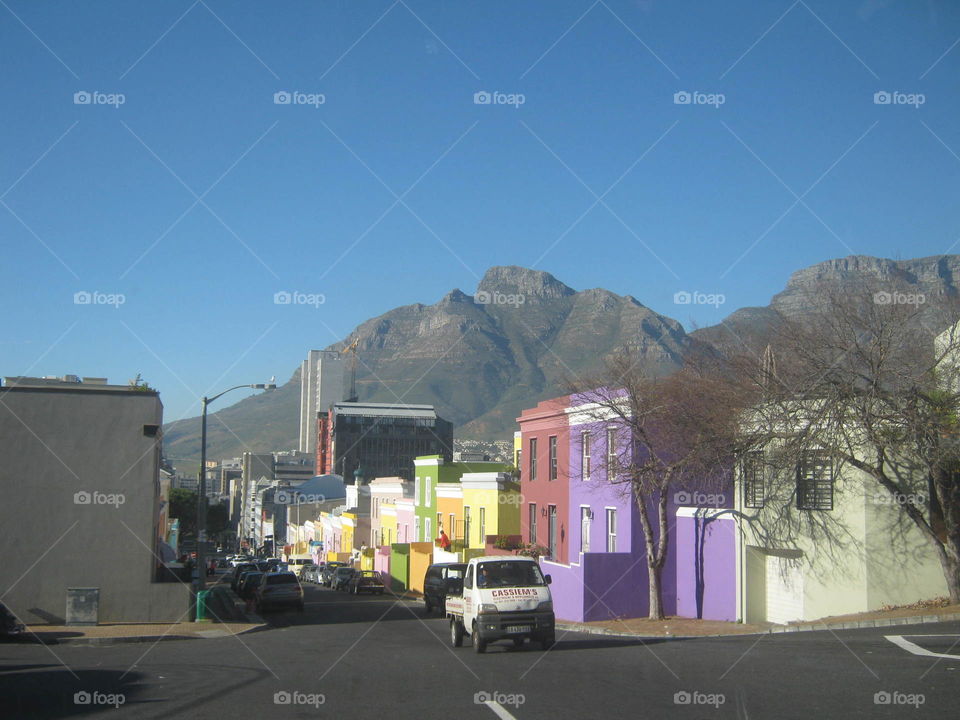 Bo-Kaap or the old Malay quaters in Cape Town, South Africa with the mountain in the background. a popular tourist attraction.