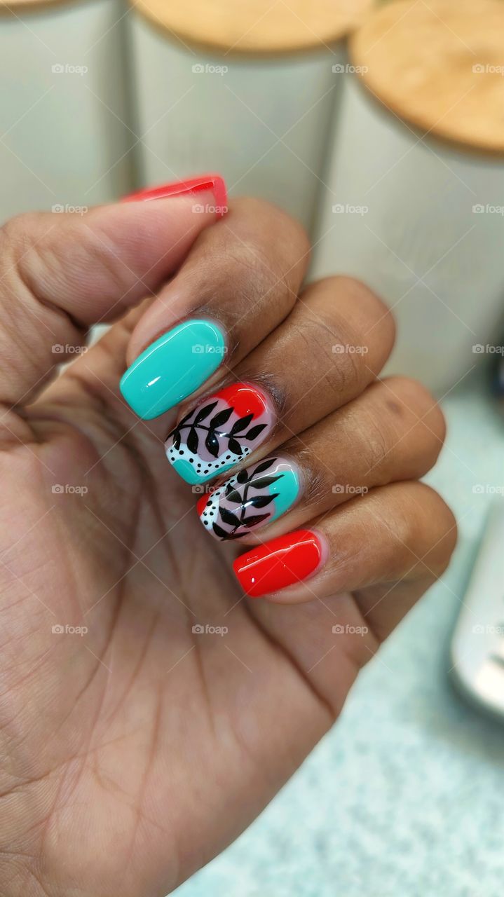 Shiny tropical/autumnal teal and orange nails