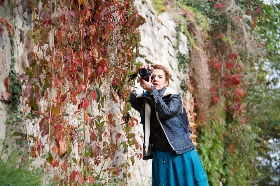 Woman photographing at outdoors