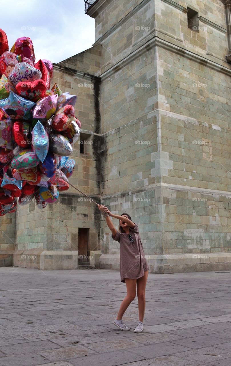 Girl with balloons