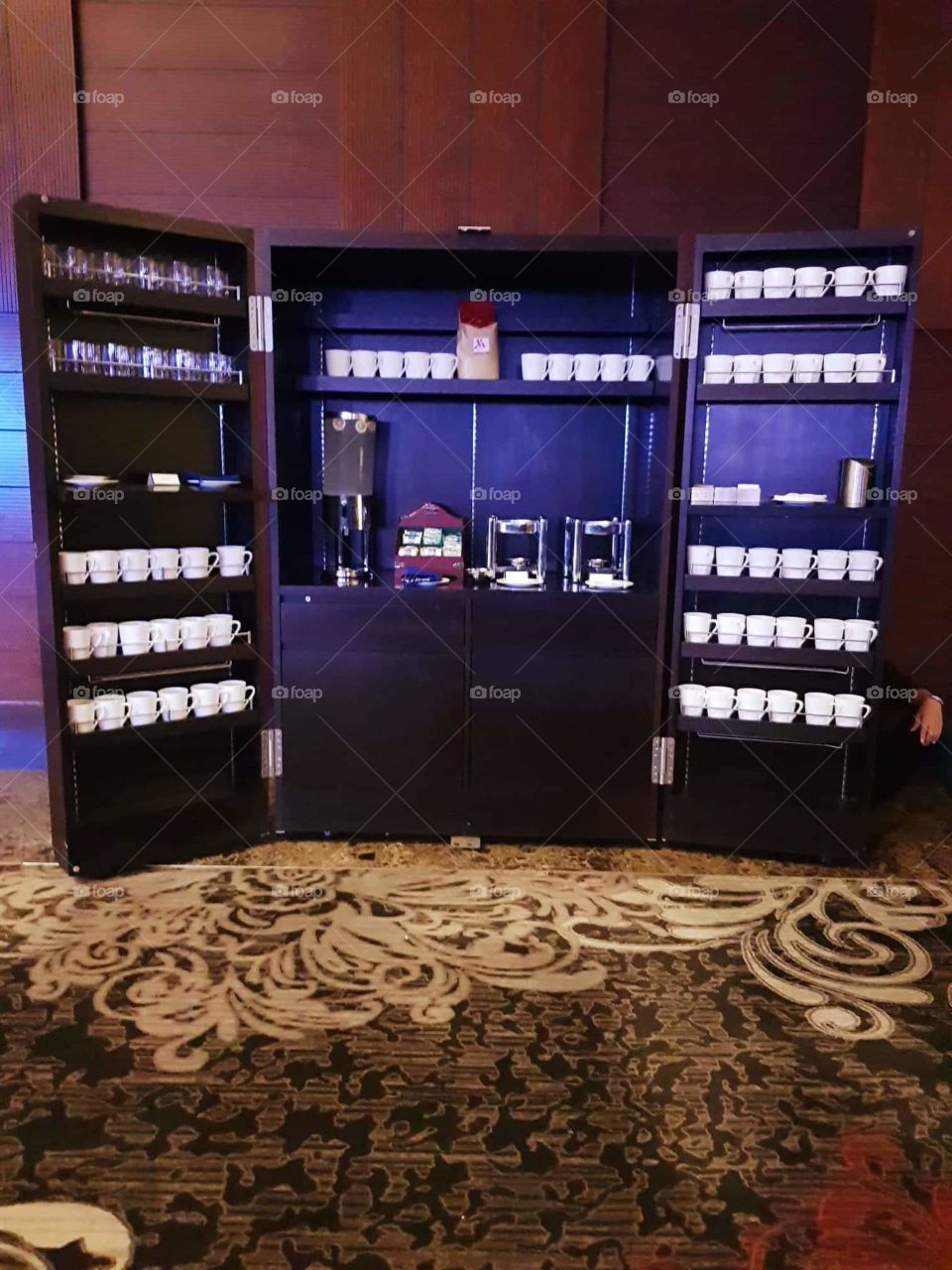 Exceedingly convenient complete coffeemaker cabinet/ set for business or any special events.