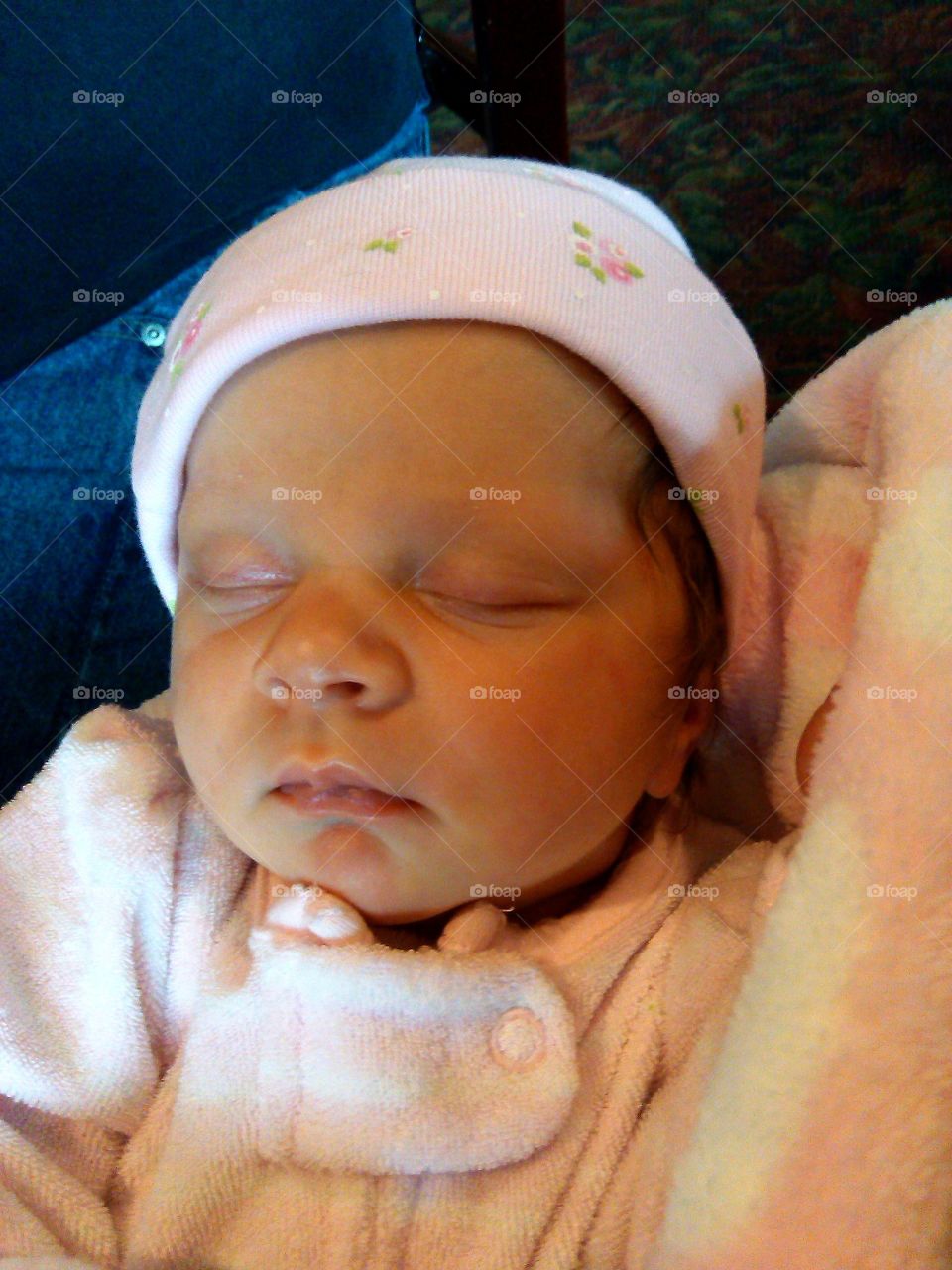 Safely Sleeping. Cuddled in Grandmas arms feeling safe & loved.