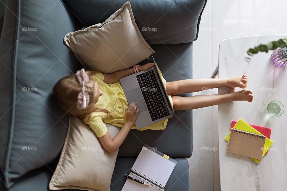 Girl studying online at home 