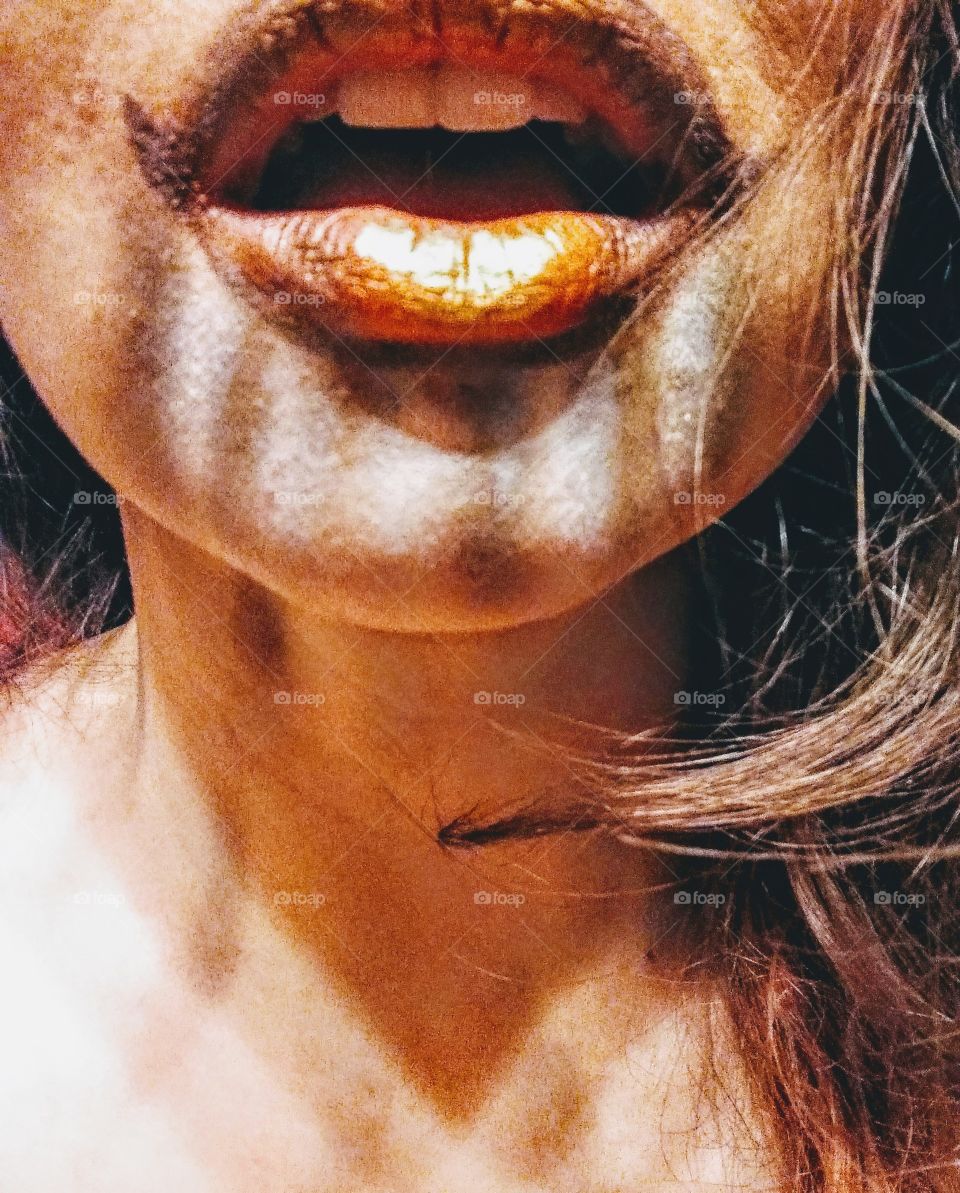 close-up of mouth and chin with makeup