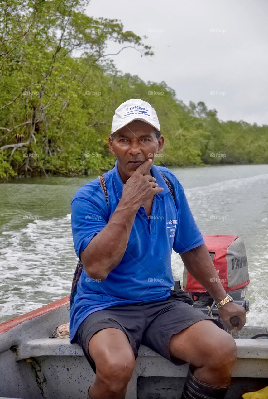 Man sitting in boat