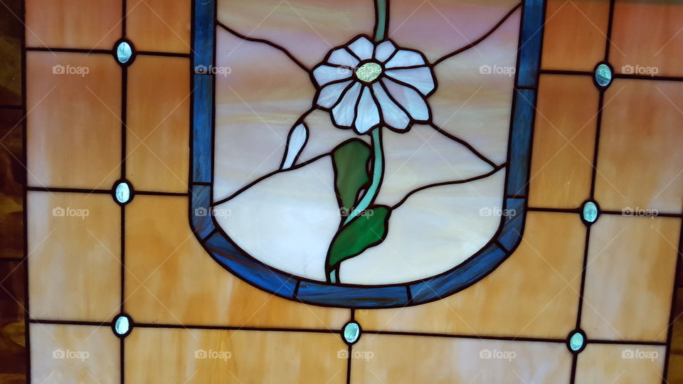 Stained glass window with flower
