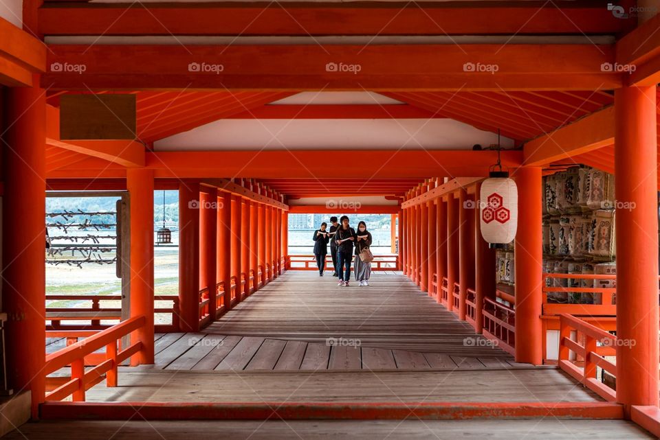 "Shrine perspective"

Tourists visiting the colorful and beautiful Itsukushima Shrine's premises at Miyajima, Hiroshima Prefecture, Japan

http://www.picardo.photography/Portfolio/Street-photography/i-qtfbDfm/A