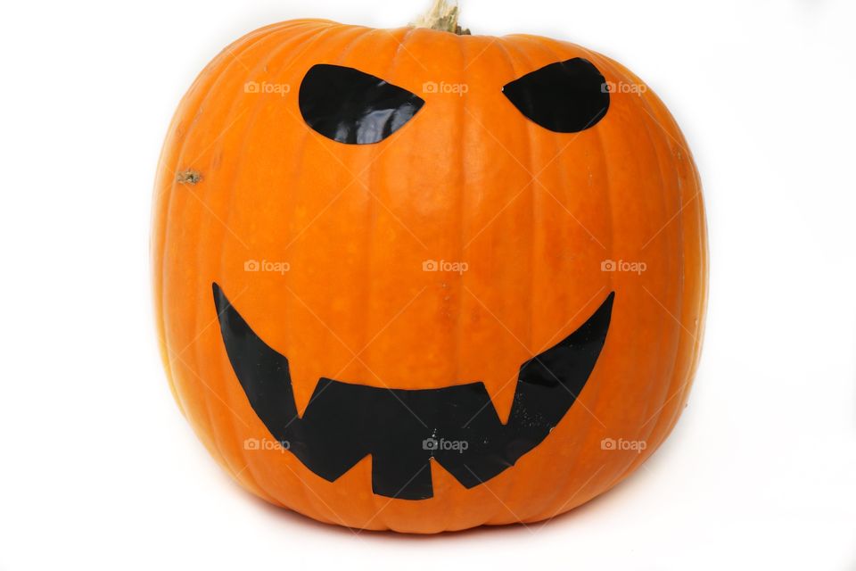Pumpkin with black smile and eyes for Halloween 