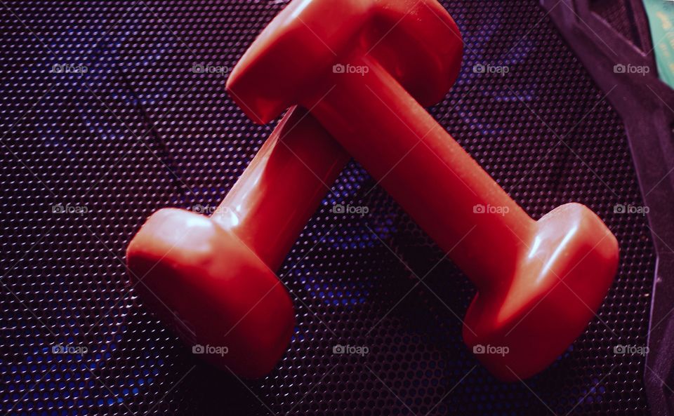 red dumbbells