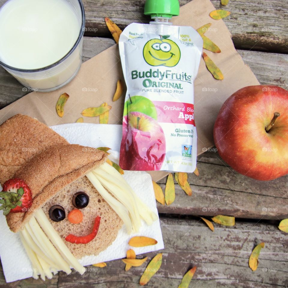 Buddy fruits with scarecrow sandwich and Fall leaves