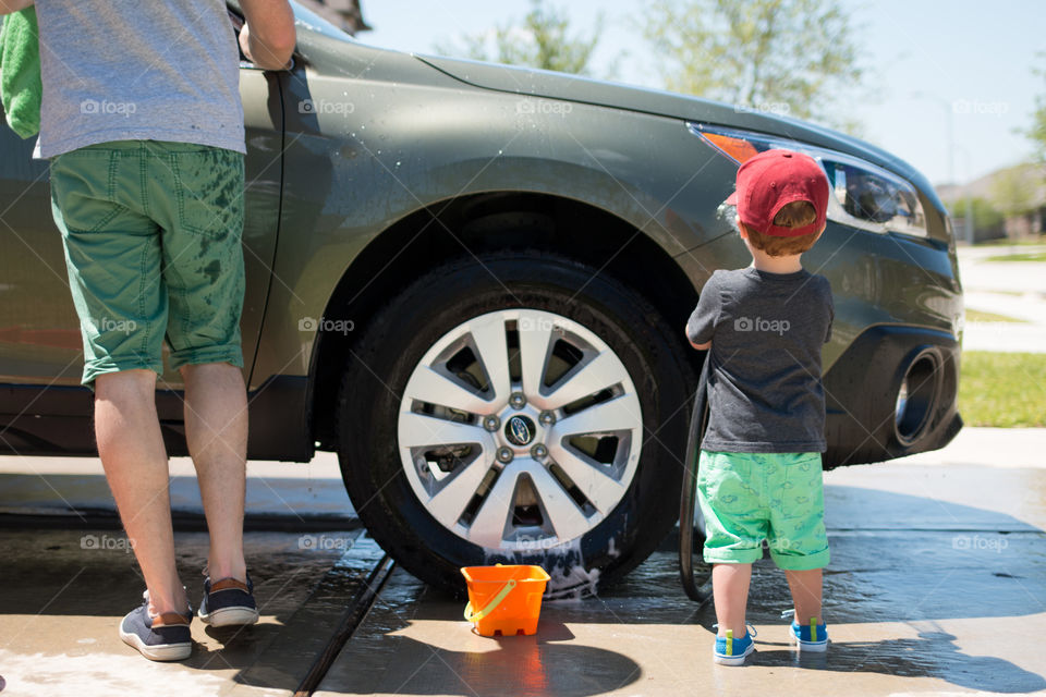 Helping wash the car