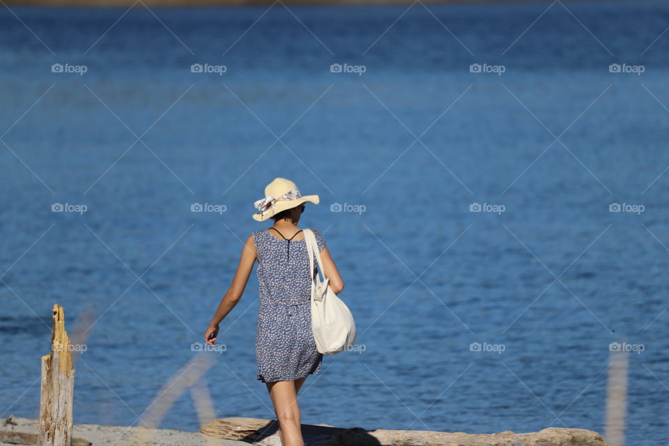 Woman walking on the beach 