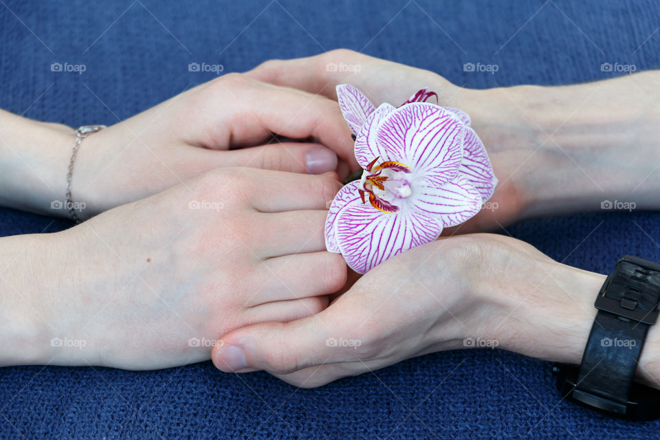 Couple holding hands