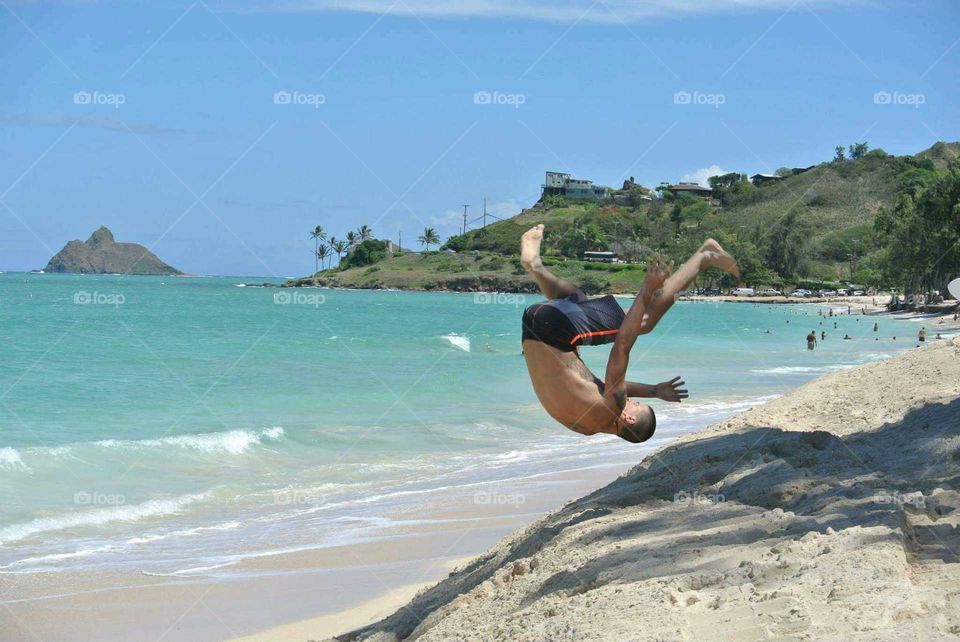 Frontflip off the beach