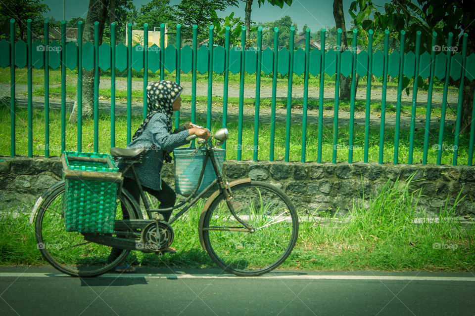 woman and bike Indonesia