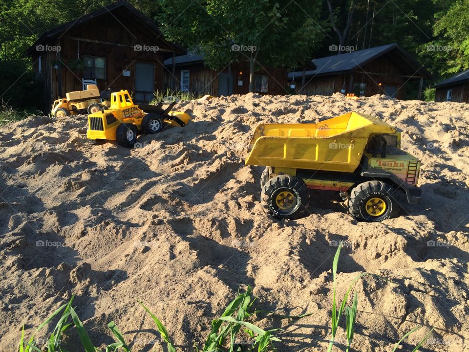 Trucks in sandbox