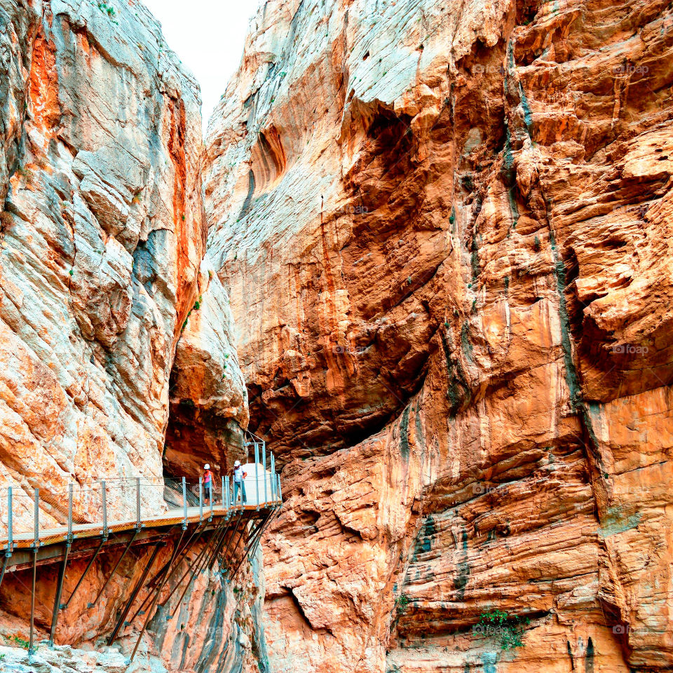 El Caminito del Rey is a passage built on the walls of the Gaitanes gorge, between the municipalities of Ardales, Álora and Antequera, in the province of Málaga, autonomous community of Andalucía, Spain. It is a pedestrian walkway of more than 3 kilometers (in addition to 4.8 kilometers of access), attached to the rock inside a canyon, with sections of a width of just 1 meter, hanging up to 105 meters above the river, in almost vertical walls.