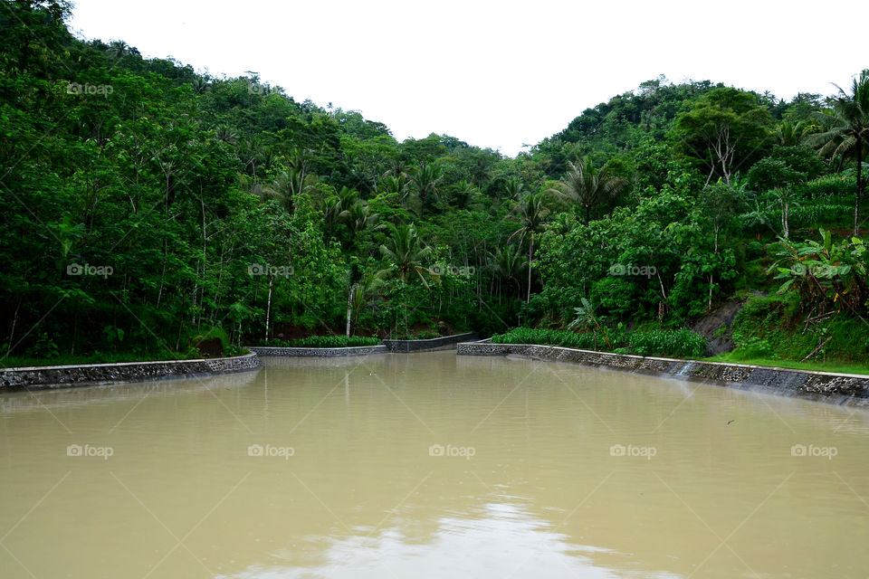Kaliduren Dam in Purwoharjo Samigaluh Kulon Progo Village, Yogyakarta, Sunday 28 December 2014. The dam serves to maintain water flow for agriculture during the dry season.
