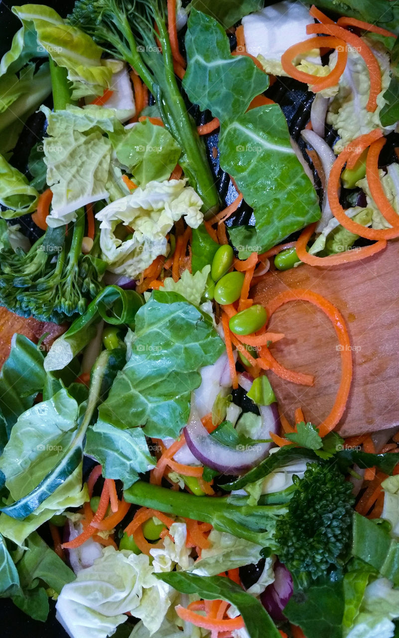 Frying vegetables and soya beans