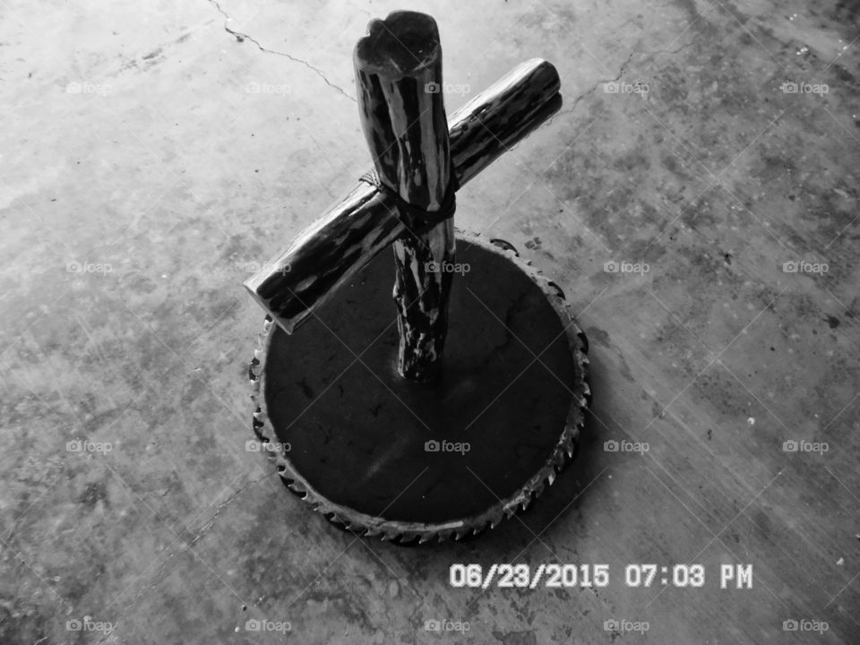 my saw blade cross ➕. This is a picture of a cross made out of an old cedar post. He grew the tree he knew would be used to make this cross