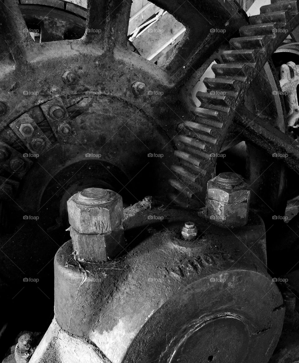 Heavy duty industrial gears used to engage an old dredging machine. 