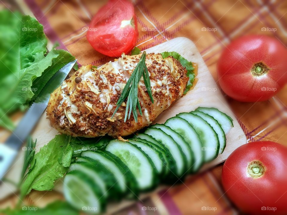 baked chicken fillet and cucumbers, homemade food