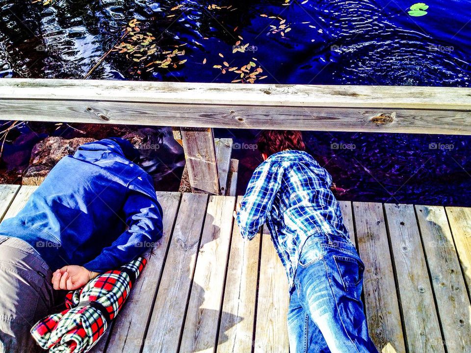 Boys exploring a Lake in Sweden