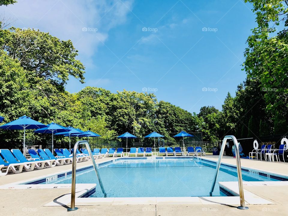 Poolside, beautiful,calm, sunny,and serene. 